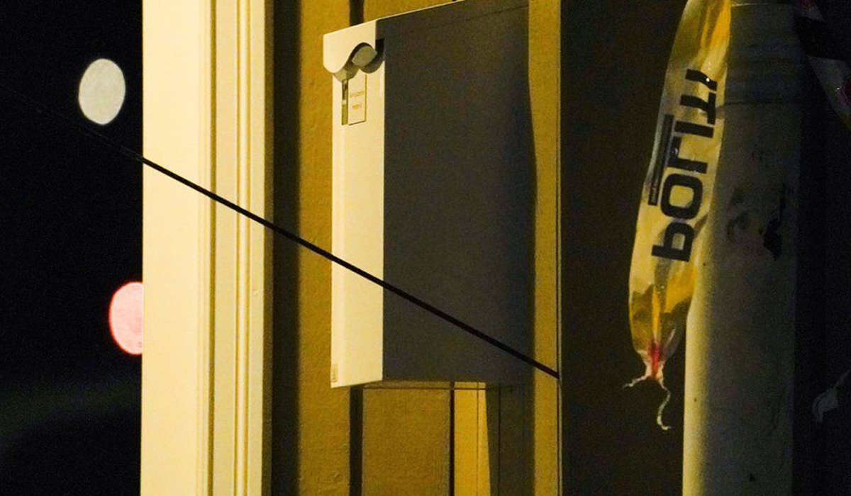 An arrow could be seen sticking out of a wall after the attack